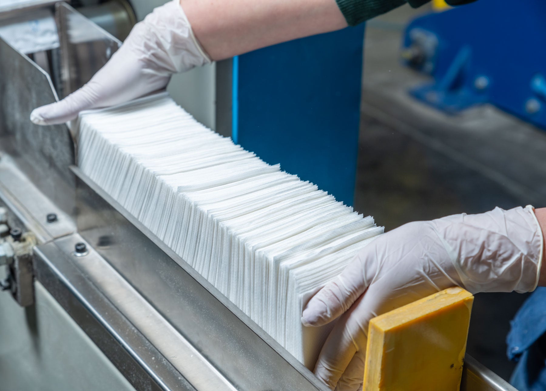 Quality check at Tisha Hygiene production facility